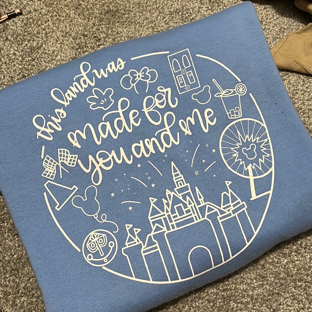 Disneyland small shop “this land was made for you and me” sweatshirt!